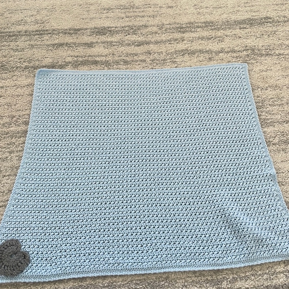 Blue crocheted baby blanket